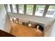 Open floor plan with hardwood floors and wall of windows at 1809 Silver Ridge Ct, Stone Mountain, GA 30087