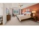 Spacious main bedroom with a king-size bed and an accent wall at 338 Elgin Dr, Lawrenceville, GA 30045