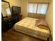 Bedroom with a bed, dresser, and TV at 1189 Ashborough Se Dr # J, Marietta, GA 30067