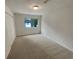 Spacious bedroom with neutral walls and carpet at 1472 Pine Log Ne Rd, Conyers, GA 30012