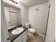 Neat bathroom with white vanity and gray countertop at 1472 Pine Log Ne Rd, Conyers, GA 30012