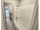 Updated bathroom with bathtub and shower at 1472 Pine Log Ne Rd, Conyers, GA 30012