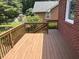 Spacious deck with wooden railings, overlooking the backyard at 265 Regal Dr, Lawrenceville, GA 30046