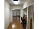 Hallway with hardwood floors and wet bar at 265 Regal Dr, Lawrenceville, GA 30046