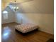 Large bedroom with hardwood floors and a chandelier at 265 Regal Dr, Lawrenceville, GA 30046