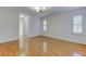 Spacious bedroom with hardwood floors and ample natural light at 265 Regal Dr, Lawrenceville, GA 30046