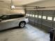 Attached garage with automatic door opener and ample space at 265 Regal Dr, Lawrenceville, GA 30046