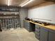 Organized workshop with storage shelves and workbench at 265 Regal Dr, Lawrenceville, GA 30046