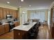 Kitchen with island and breakfast area at 265 Regal Dr, Lawrenceville, GA 30046