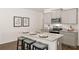 Open concept kitchen with island and granite countertops at 348 Elgin Dr # 162, Lawrenceville, GA 30045