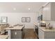 Modern kitchen with island and stainless steel appliances at 348 Elgin Dr # 162, Lawrenceville, GA 30045