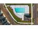 Community pool with surrounding landscaping and patio area at 348 Elgin Dr # 162, Lawrenceville, GA 30045