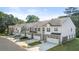 Row of townhouses with attached garages and landscaping at 348 Elgin Dr # 162, Lawrenceville, GA 30045