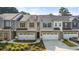 Two-story townhouses with attached garages and landscaping at 348 Elgin Dr # 162, Lawrenceville, GA 30045