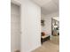 Clean hallway featuring a bench, open shelving, and a closet at 348 Elgin Dr # 162, Lawrenceville, GA 30045