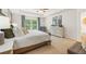 Relaxing main bedroom with plush bedding and a large window at 348 Elgin Dr # 162, Lawrenceville, GA 30045