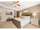 Spacious primary bedroom with king-size bed and ensuite bathroom at 348 Elgin Dr # 162, Lawrenceville, GA 30045