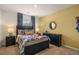 Cozy bedroom with a superhero-themed comforter and plenty of storage at 348 Elgin Dr # 162, Lawrenceville, GA 30045