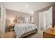 Cozy bedroom with a queen bed and adjacent bathroom at 348 Elgin Dr # 162, Lawrenceville, GA 30045