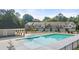 Community pool and clubhouse with ample green space at 348 Elgin Dr # 162, Lawrenceville, GA 30045