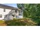 Townhome backyard with private patio and wooded views at 348 Elgin Dr # 162, Lawrenceville, GA 30045