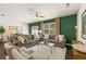 Relaxing living room with ample seating and access to backyard at 328 Elgin Dr, Lawrenceville, GA 30045