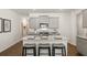 Open concept kitchen featuring granite island and stainless steel appliances at 328 Elgin Dr, Lawrenceville, GA 30045