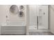 Spa-like bathroom featuring a soaking tub and a walk-in shower at 328 Elgin Dr, Lawrenceville, GA 30045