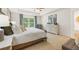 Spacious main bedroom with plush carpet and large windows at 328 Elgin Dr, Lawrenceville, GA 30045