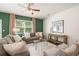 Bright living room featuring comfortable seating and a stylish coffee table at 328 Elgin Dr, Lawrenceville, GA 30045