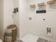 Bright laundry room with shelving and built-in storage at 328 Elgin Dr, Lawrenceville, GA 30045