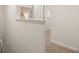 Upstairs hallway with a half wall and neutral decor at 328 Elgin Dr, Lawrenceville, GA 30045