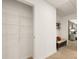 Hallway with linen closet and bench at 328 Elgin Dr, Lawrenceville, GA 30045