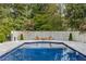 Swimming pool with fire pit and seating area at 4197 Sentinel Post Nw Rd, Atlanta, GA 30327