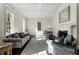 Bright living room featuring hardwood floors, a fireplace, and coffered ceilings at 4197 Sentinel Post Nw Rd, Atlanta, GA 30327