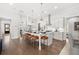 Open concept kitchen with large island and hardwood floors at 3739 Tielman St, Snellville, GA 30078