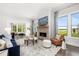 Spacious living room with fireplace and large windows at 3739 Tielman St, Snellville, GA 30078