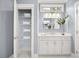 Bathroom features a vanity with storage and linen closet at 3739 Tielman St, Snellville, GA 30078