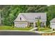 Beautiful home with a metal roof, and a spacious front yard at 3739 Tielman St, Snellville, GA 30078