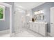 Spa-like bathroom with a soaking tub and walk-in shower at 3739 Tielman St, Snellville, GA 30078