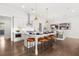 Modern kitchen with white cabinets, large island, and stainless steel appliances at 3739 Tielman St, Snellville, GA 30078