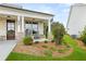 Charming front porch with stone accents and plenty of seating at 3739 Tielman St, Snellville, GA 30078