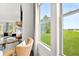 Living area with a view of the backyard and green space at 3739 Tielman St, Snellville, GA 30078