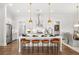 Spacious kitchen with island, stainless steel appliances, and white cabinetry at 3739 Tielman St, Snellville, GA 30078