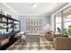 Home office with built-in shelving and comfortable seating at 3739 Tielman St, Snellville, GA 30078