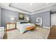 Main bedroom with hardwood floors and large windows at 3739 Tielman St, Snellville, GA 30078