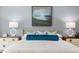 Main bedroom with large bed, night stands and artwork at 3739 Tielman St, Snellville, GA 30078