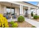 Relaxing front porch with stone pillars and comfortable seating at 3739 Tielman St, Snellville, GA 30078