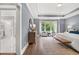 Spacious main bedroom with sitting area and access to en-suite bathroom at 3739 Tielman St, Snellville, GA 30078