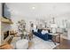 Open living space with fireplace and views into kitchen at 3739 Tielman St, Snellville, GA 30078